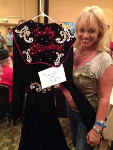Karen McDaniel with a robe she made for Tully Blanchard.